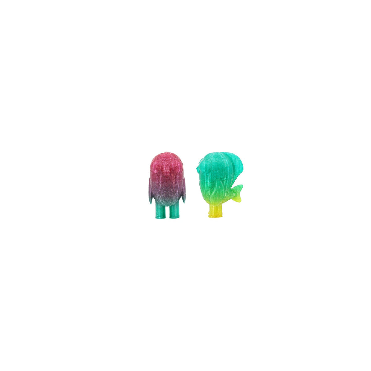 Two colorful Gillkins figurines on a white background
