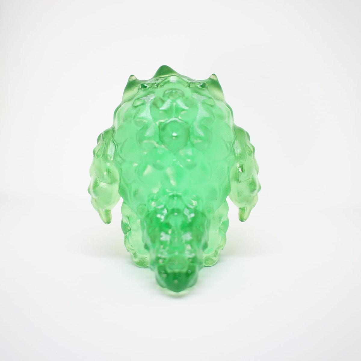 Handmade Nuggemon 3" Resin Figure (NuggeShard Edition) viewed from the back, showcasing its translucent green design.