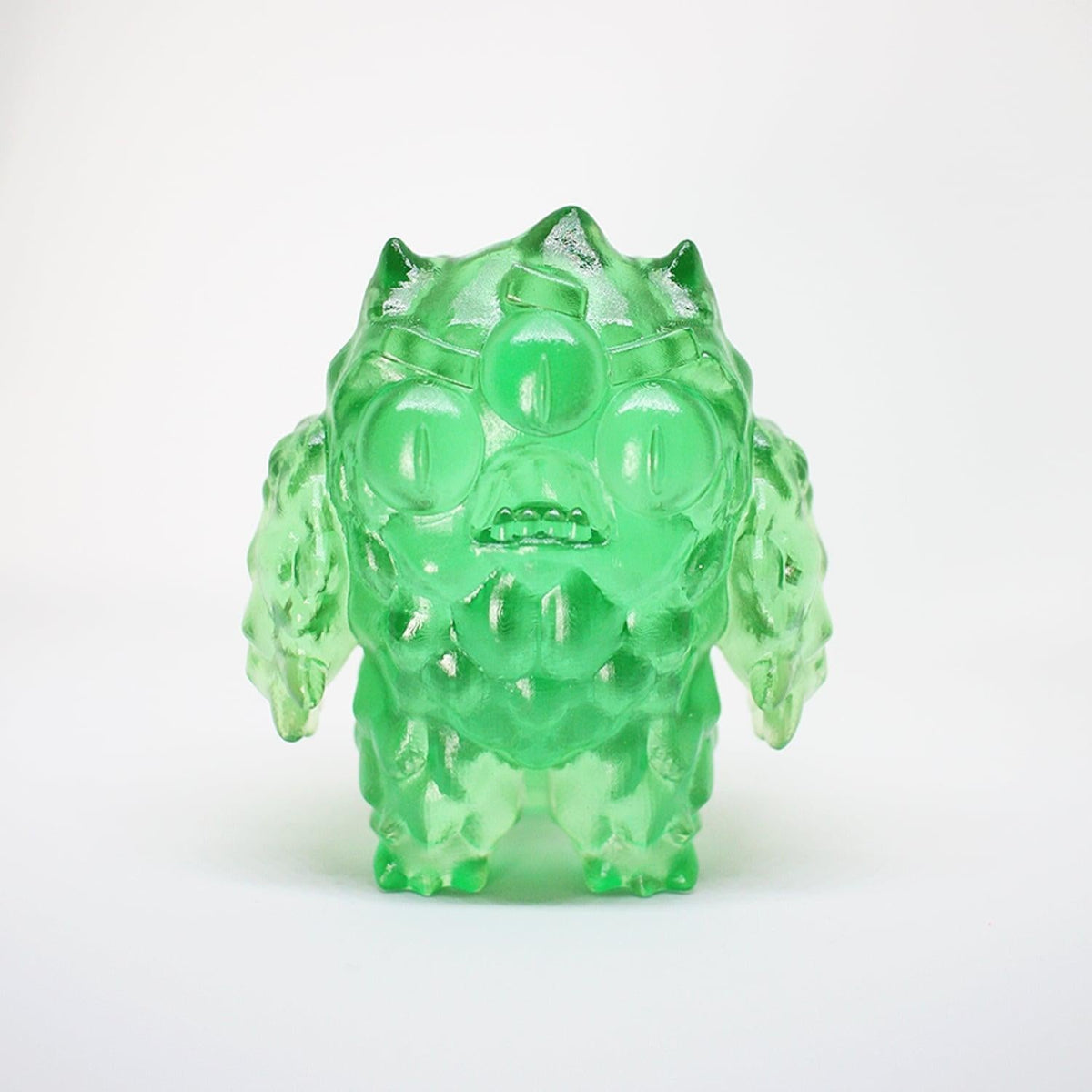 Handmade Nuggemon 3" Resin Figure (NuggeShard Edition) in translucent green with unique texture.
